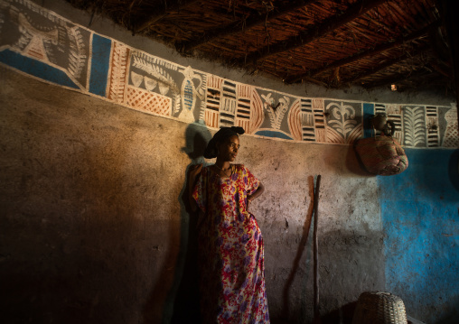 Ethiopia, Kembata, Alaba Kuito, ethiopian woman inside her traditional painted and decorated house