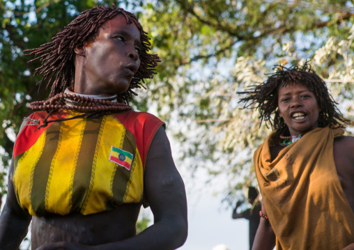 Hamer tribe women dancing during a bull jumping ceremony, Omo valley, Turmi, Ethiopia