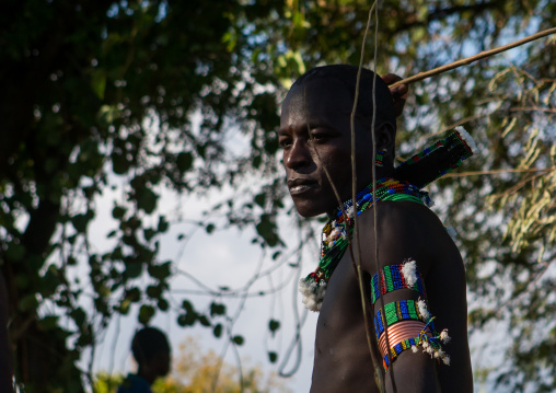 Hamer tribe maze whipping a woman during a bull jumping ceremony, Omo valley, Turmi, Ethiopia