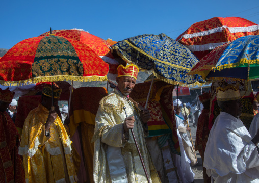 Ethiopian orthodox priests procession celebrating the colorful Timkat epiphany festival, Amhara region, Lalibela, Ethiopia