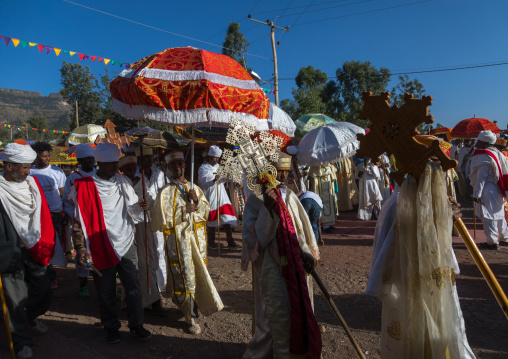 Ethiopian orthodox priests procession celebrating the colorful Timkat epiphany festival, Amhara region, Lalibela, Ethiopia