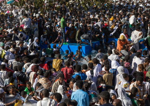 Holy water sprayed onto the crowd attending Timkat celebrations of epiphany, Amhara region, Lalibela, Ethiopia