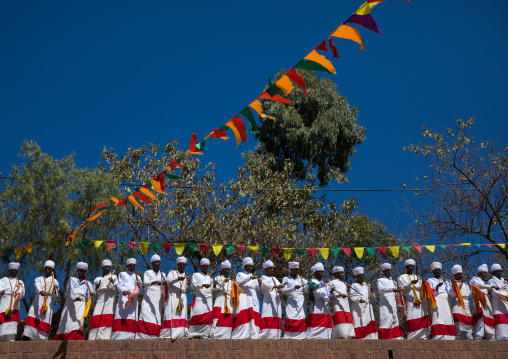 Ethiopian orthodox priests in line celebrating the colorful Timkat epiphany festival, Amhara region, Lalibela, Ethiopia