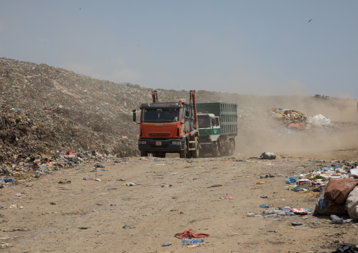 Trucks in Koshe rubbish dump, Addis Ababa region, Addis Ababa, Ethiopia