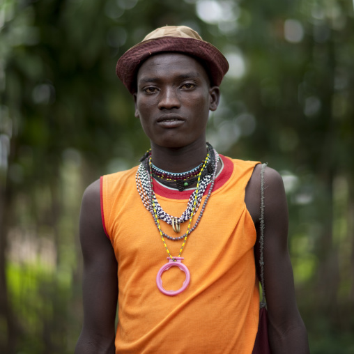 Menit man wearing western clothes, Tum market, Omo valley, Ethiopia