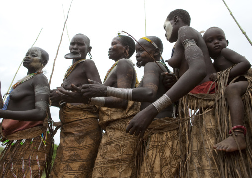 Suri Women Dancing In Kibbish, Omo Valley, Ethiopia