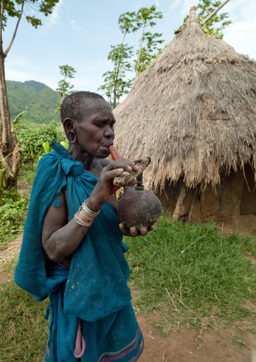 Old Woman Smoking, Turgit Village, Omo Valley, Ethiopia