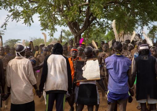 Bodi tribe fat men dancing during Kael ceremony, Omo valley, Hana Mursi, Ethiopia