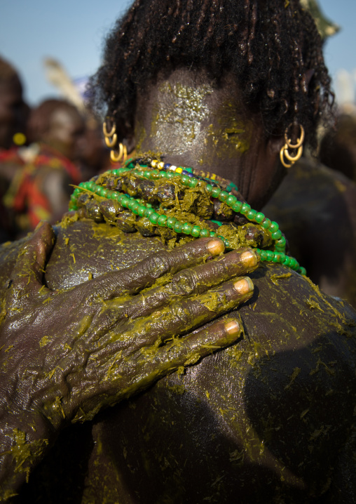 People covering themselves with cow dungs during the proud ox ceremony in the Dassanech tribe, Turkana County, Omorate, Ethiopia