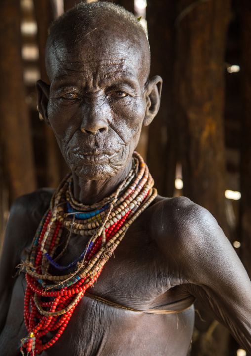 Mrs Moko who had to kill ten children she had before her wedding and who were mingis, Omo valley, Korcho, Ethiopia