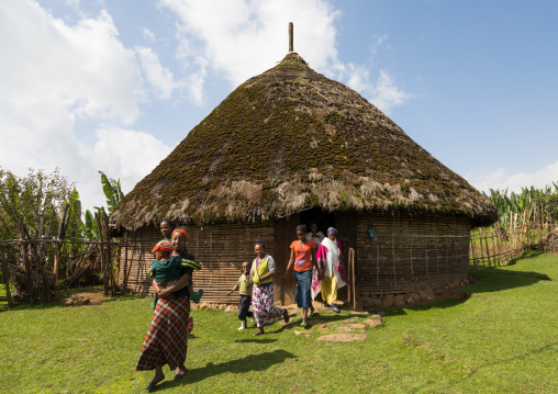People in front of a Gurage traditional house with thatched roof, Gurage Zone, Butajira, Ethiopia
