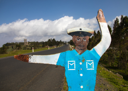 Fake cop mannequin along the road in order to make people respect the speed limit, Gurage Zone, Butajira, Ethiopia