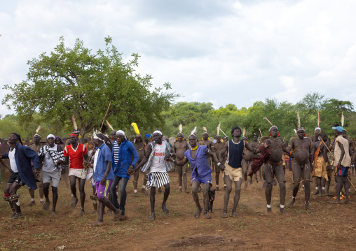 Bodi tribe fat men dancing during Kael ceremony, Omo valley, Hana Mursi, Ethiopia