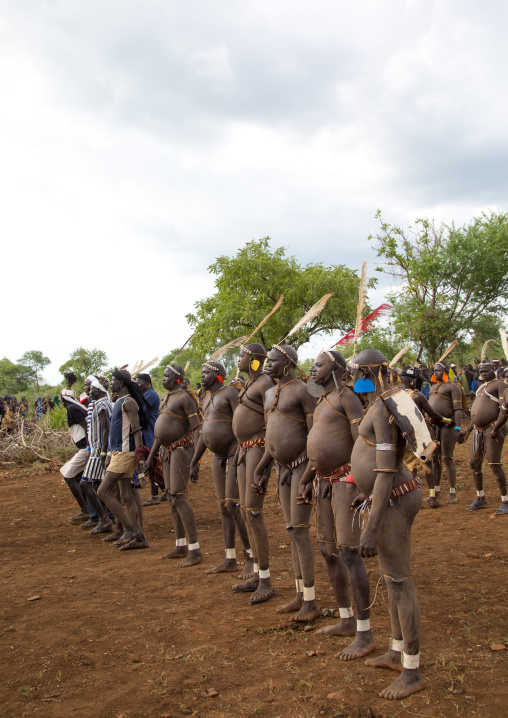 Bodi tribe fat men during Kael ceremony, Omo valley, Hana Mursi, Ethiopia