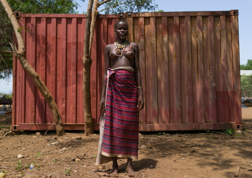 Portrait of a sudanese Toposa tribe woman refugee with scarifications on her body, Omo Valley, Kangate, Ethiopia