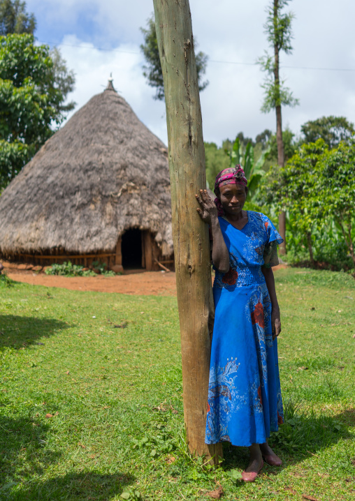 Ethiopian woman in front of her traditional house, Gamo Gofa Zone, Ganta, Ethiopia
