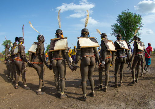 Bodi tribe fat men during Kael ceremony, Omo valley, Hana Mursi, Ethiopia
