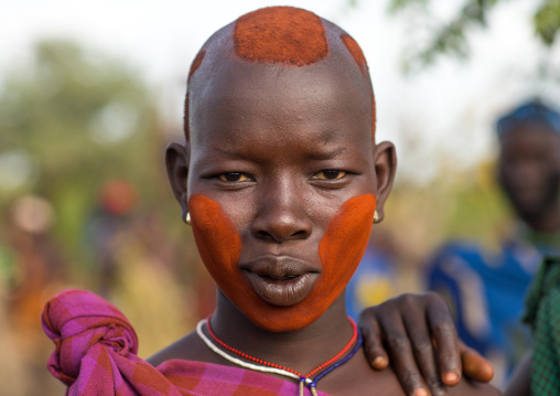 Beautiful young woman with make up during the fat men ceremony in the Bodi tribe, Omo valley, Hana Mursi, Ethiopia