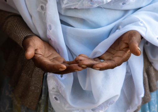 Hands of an ethiopian muslim woman praying, Harari Region, Harar, Ethiopia
