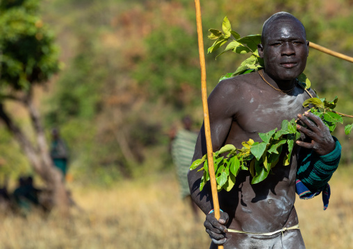 Suri tribe warrior during a donga stick fighting ritual, Omo valley, Kibish, Ethiopia