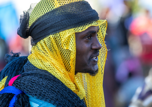 Oromo man selling scarves in the market, Amhara region, Senbete, Ethiopia