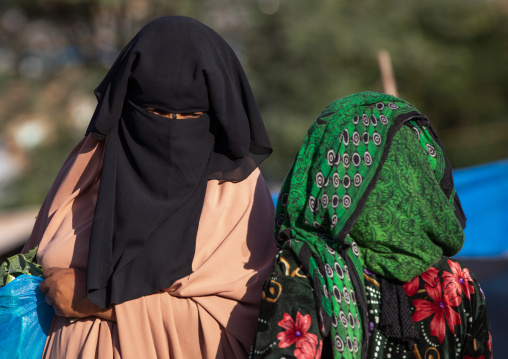 Oromo woman wearing a burqa in the market, Amhara region, Senbete, Ethiopia