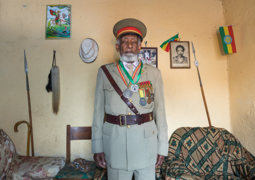 Ethiopian veteran from the italo-ethiopian war in army uniform in his home, Addis Ababa Region, Addis Ababa, Ethiopia