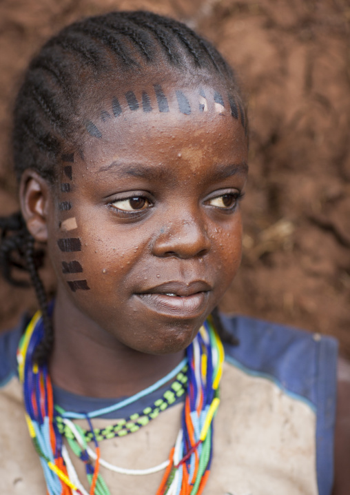 Girl from menit tribe with facial tattoos, Jemu, Omo valley, Ethiopia