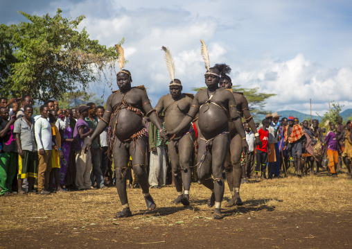 Bodi Tribe Fat Men Running During Kael Ceremony, Hana Mursi, Omo Valley, Ethiopia