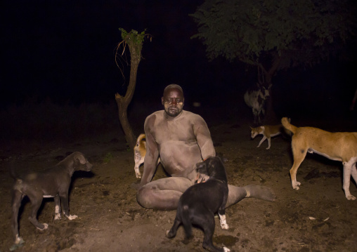 Bodi Tribe Fat Man Resting After Drinking Blood, Hana Mursi, Omo Valley, Ethiopia