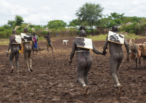 Bodi Tribe Fat Men Going To The Kael Ceremony, Hana Mursi, Omo Valley, Ethiopia