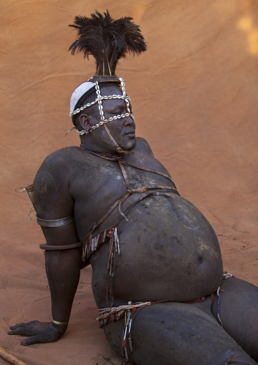 Bodi Tribe Fat Man Resting During Kael Ceremony, Hana Mursi, Omo Valley, Ethiopia