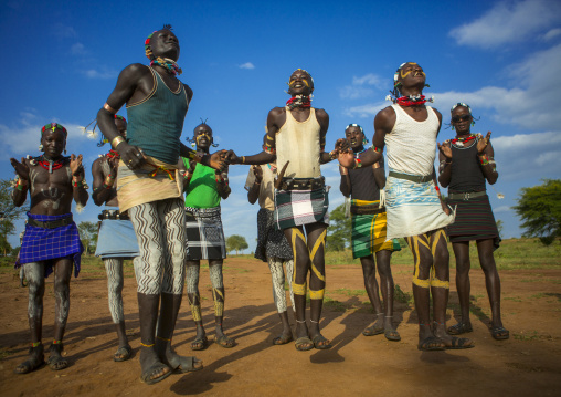 Bashada Tribe Men Dancing And Jumping, Dimeka, Omo Valley, Ethiopia