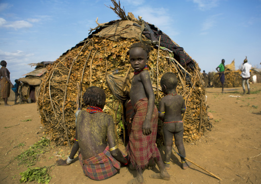 Dassanech Tribe Children Standing In Front Of His House, Omorate, Omo Valley, Ethiopia