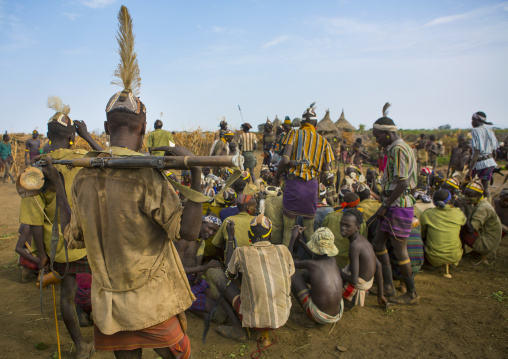 Dassanech Tribe Warriors Sharing Cow Meat During A Ceremony, Omorate, Omo Valley, Ethiopia