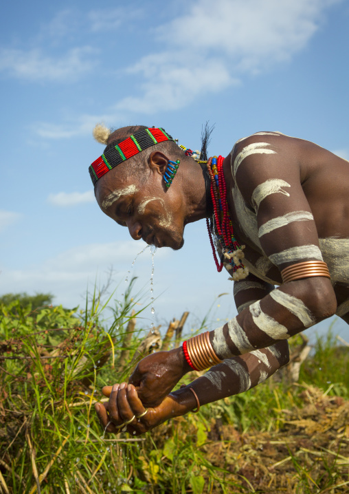 Bashada Tribe Man Making Body Painting, Dimeka, Omo Valley, Ethiopia