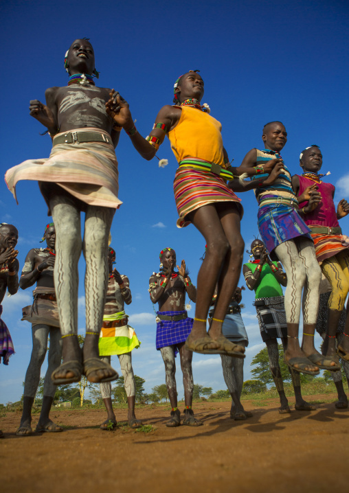 Bashada Tribe Men Dancing And Jumping, Dimeka, Omo Valley, Ethiopia