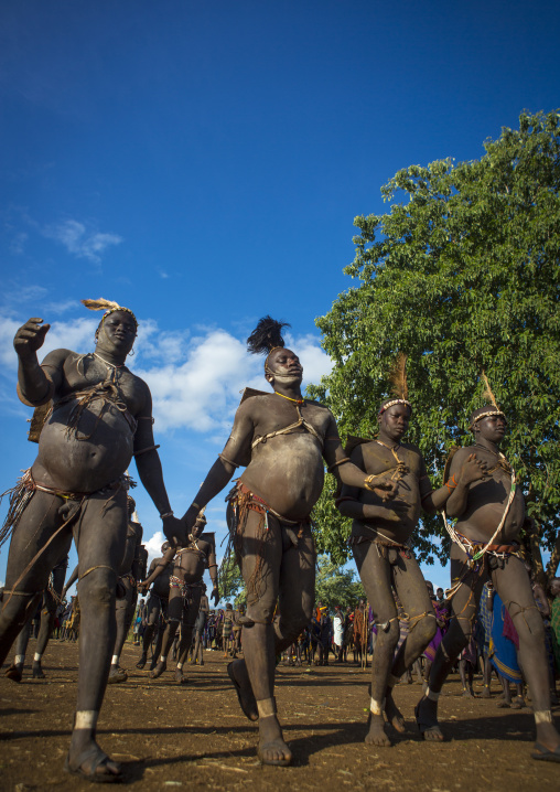 Bodi Tribe Fat Men Running During Kael Ceremony, Hana Mursi, Omo Valley, Ethiopia