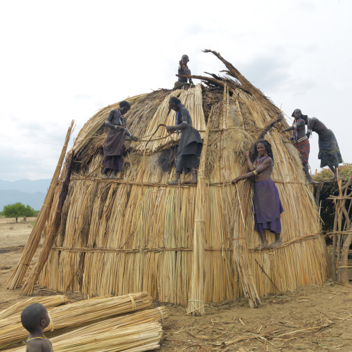 Erbore Tribe Women Building A Thatch Hut, Omo Valley, Ethiopia