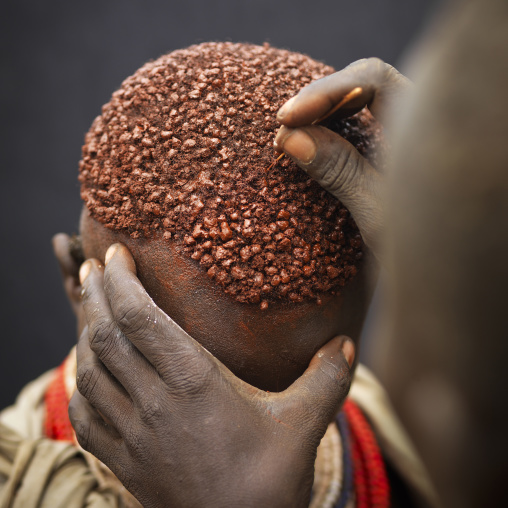 Karo Woman Getting Hair Dyed With Ochre Ethiopia