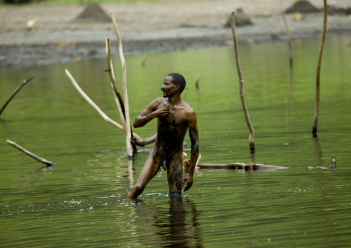 Borana Tribe Man Picking Up Salt From The Lake Of El Sod Volcano, Yabello, Omo Valley, Ethiopia
