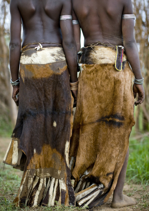 Rear View Of Nyangatom Tribe Women With Traditional Leather Skirts, Omo Valley, Kangate, Ethiopia