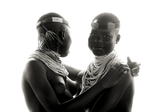Black And White Portrait Of Two Embraced Karo Tribe Women, Korcho Village, Omo Valley, Ethiopia