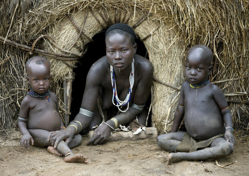 Portrait Of Karo Tribe Mother And Kids Outside Their Hut, Korcho Village, Omo Valley, Ethiopia