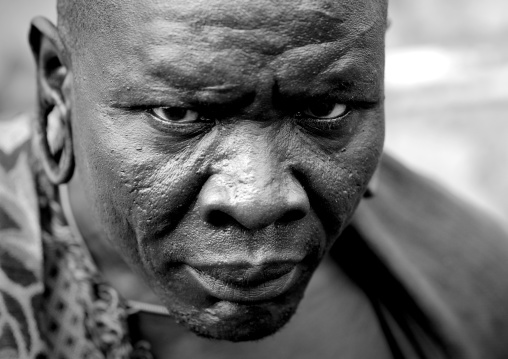 Black And White Portrait Of Surma Tribe Warrior With Enlarged Ears, Tulgit, Omo Valley, Ethiopia