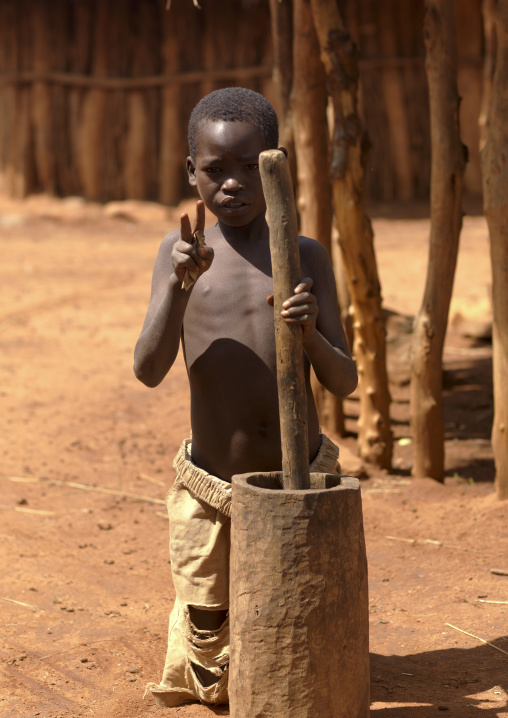 Portrait Of A Konso Tribe Kid Asking Money, Konso, Omo Valley, Ethiopia