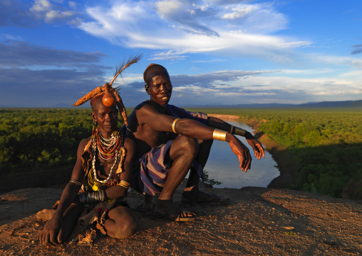 Portrait Of A Couple From Karo Tribe Over The Omo River At Sunset, Korcho Village, Ethiopia
