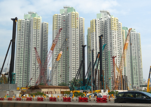 Cranes in front of residential buildings, Special Administrative Region of the People's Republic of China , Hong Kong, China