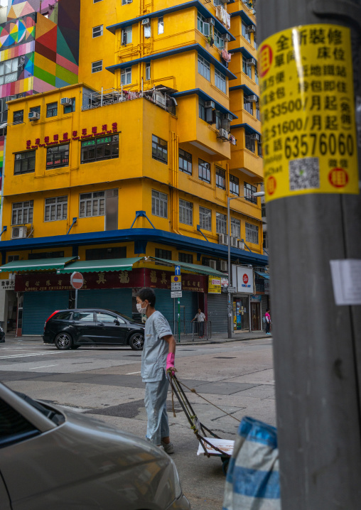 Chinese man cleaning the streets, Special Administrative Region of the People's Republic of China , Hong Kong, China