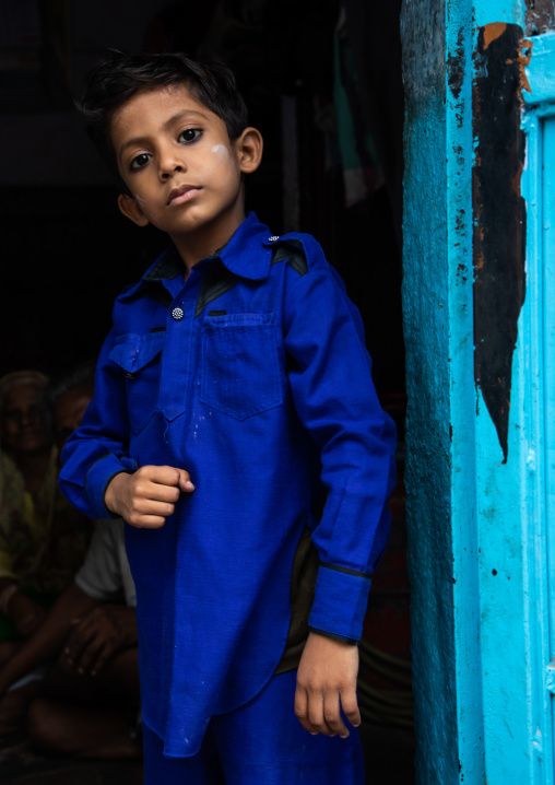 Portrait of a rajasthani boy in blue clothes, Rajasthan, Jodhpur, India